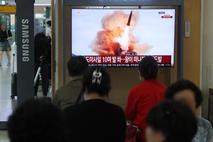 North Korea fires missile barrage after Trump overture