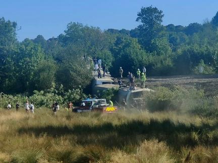 Passenger train derails in southern England