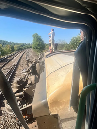 Passenger train derails in southern England