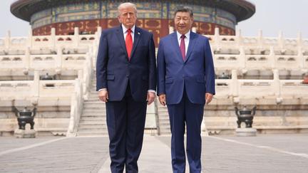 Trump returns from China summit