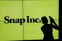 Snap slashes workforce for AI