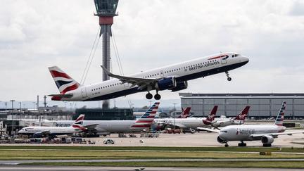 IAG issues profit warning