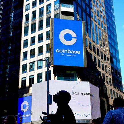 Coinbase to cut 14% of staff