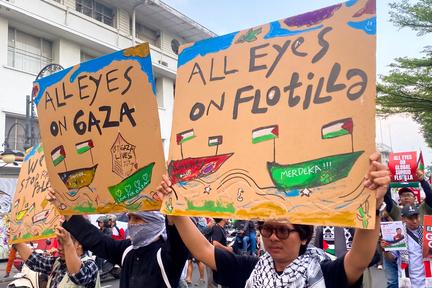 Gaza flotilla activists return home