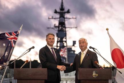 Australia, Japan sign warship deal