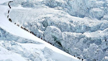 Record climbers summit Mount Everest