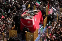 Khamenei Buried as Son's Absence Raises Questions