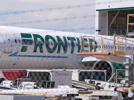 Frontier plane hits runway pedestrian