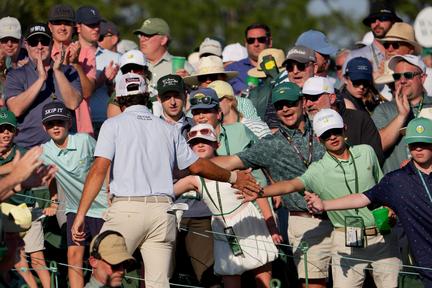 McIlroy Chokes, Young Surges