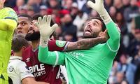 Arsenal edge closer to title