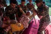 Nepal-Tibet flood death toll passes 470