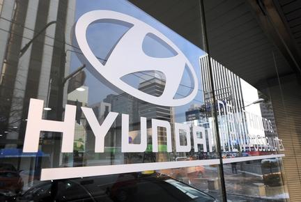 Hyundai workers stage first full-day strike in decade