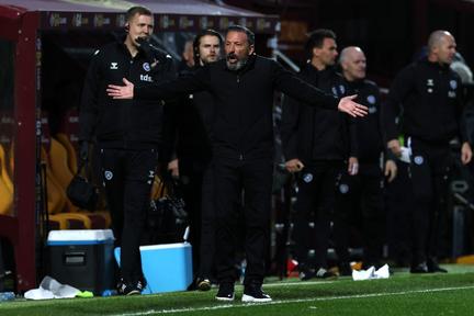 Hearts held in title race twist