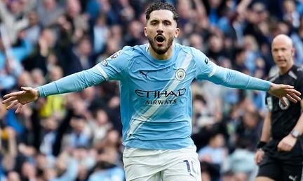 Manchester City Defeats Title Rivals