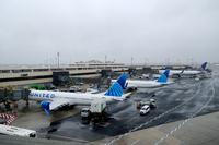 United Flight Returns Due to Threat