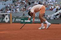 Djokovic Fights Through Paris Heat