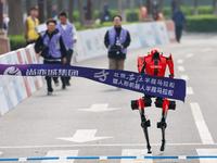 Robot Smashes Half-Marathon Record