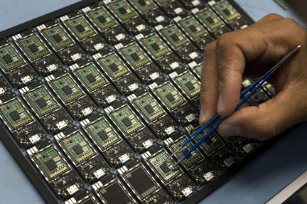 ASML Lifts Sales Forecast