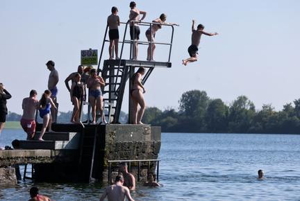 UK Swelters as Heatwave Tests Grid