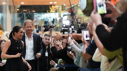 Harry and Meghan arrive in Australia