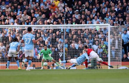 Man City Edge Arsenal in Showdown