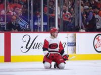 Hurricanes sweep Flyers to advance