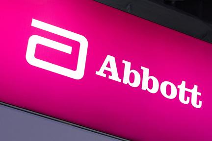 Abbott trims profit forecast