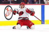 Hurricanes sweep Flyers to advance