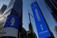 Coinbase to cut 14% of staff